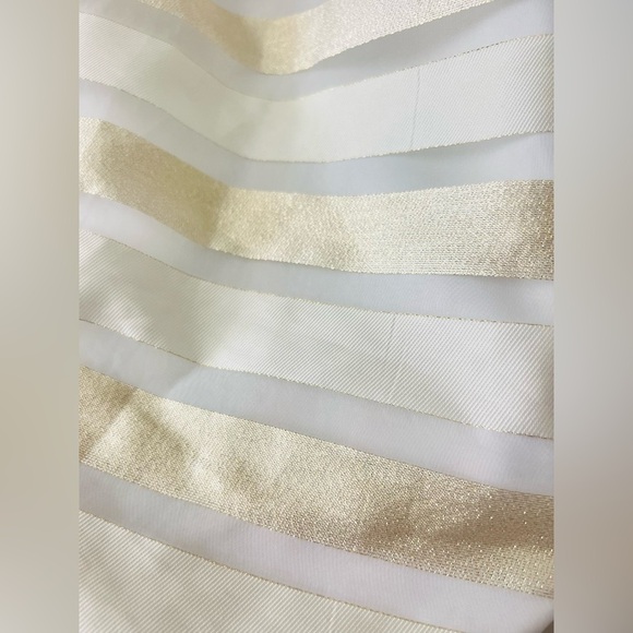 Jonathan Michelle dress size 12
17” across chest pit to pit loose on the waist - Picture 5 of 14